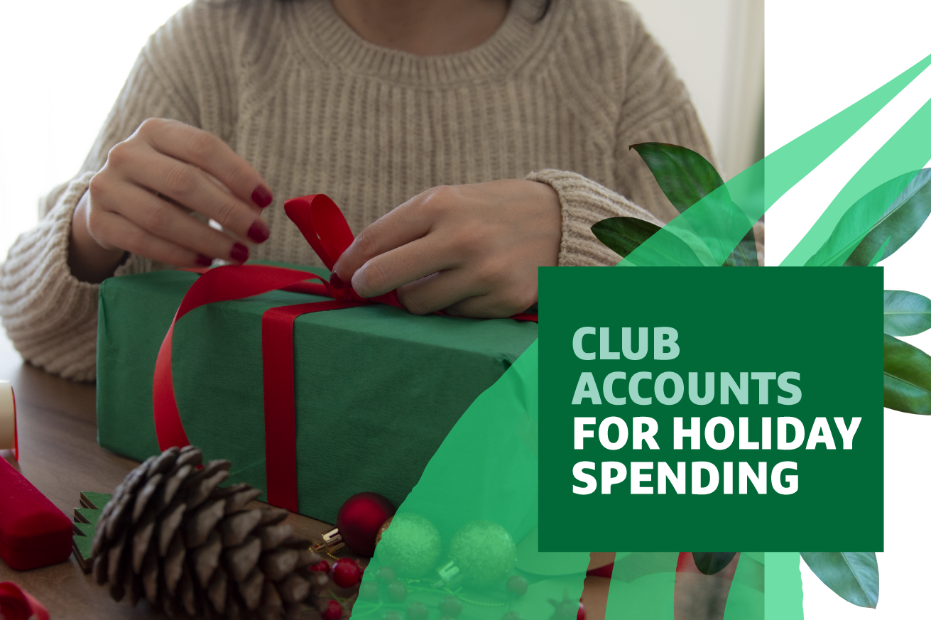 Focus on hands tying a red ribbon bow on a green holiday gift box with text headline "Club Accounts for Holiday Spending" overlaid.