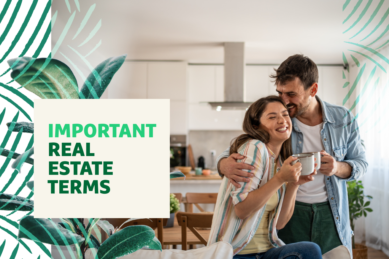 Happy couple enjoying a cup of coffee in their new house with kitchen in the background and headline text "Important Real Estate Terms" overlaid.
