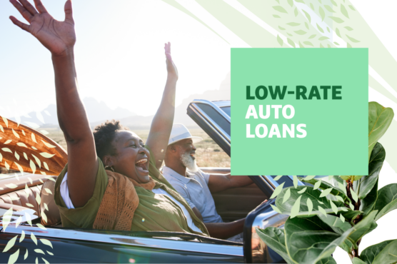 Happy couple driving with convertible top down to see mountain view with headline "Low-Rate Auto Loans" overlaid.