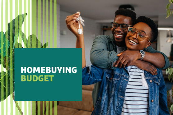 Excited, smiling couple hugging and admiring the set of keys to their new home with new home in background and headline "Homebuying Budget" overlaid.