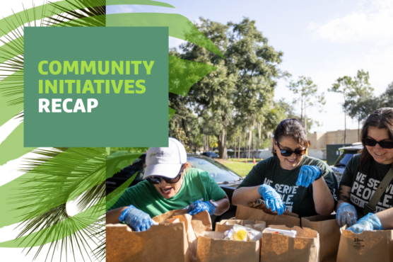 Volunteers assembling food packages at a community service event with headline “COMMUNITY INITIATIVES RECAP” overlaid.